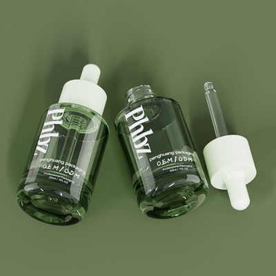 Garrafa verde de vidro luxuosa do soro das garrafas do conta-gotas do OEM 30ML 1oz