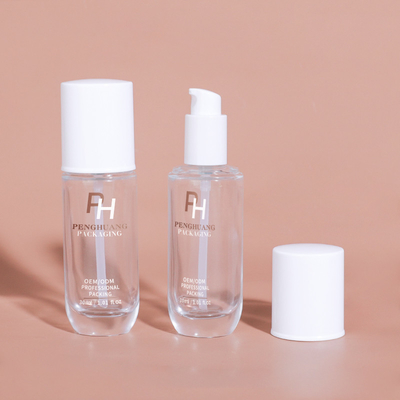 Forma redonda garrafa de base líquida vazia clara 30 ml garrafa de bomba de loção de vidro de 1 oz para embalagens cosméticas