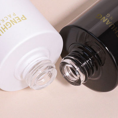 Garrafa de gotas de vidro redonda com logotipo personalizado de acordo com os requisitos do cliente