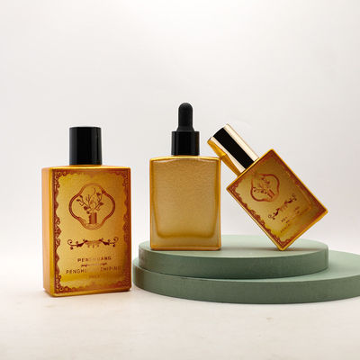 Garrafa de vidro personalizada do conta-gotas do óleo essencial do soro luxuoso vazio cosmético do quadrado do ouro do óleo 30ml 50ml 100ml