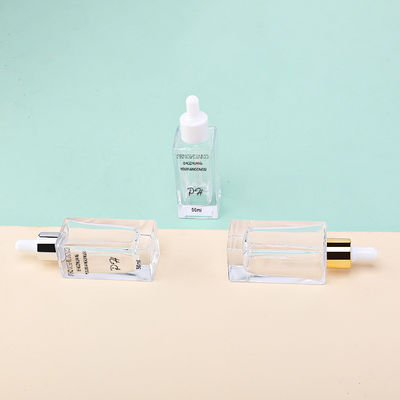 O quadrado de vidro de empacotamento cosmético por atacado do conta-gotas dos cuidados com a pele 50ml engarrafa a garrafa de vidro do soro