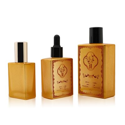 O conta-gotas dourado de vidro do soro de Lucury engarrafa o óleo do perfume que empacota Logo Custom 50ml 100ml 120ml