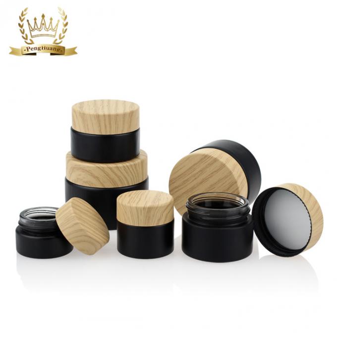 O recipiente de creme pequeno geou frascos cosméticos de vidro pretos com o creme plástico de bambu dos cuidados com a pele do tampão de parafuso da tampa de bambu da cor em volta de SZY